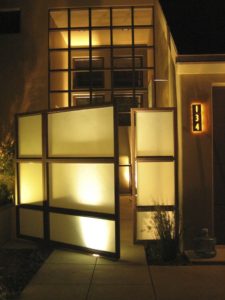 geometric gate before modern Seattle home front door